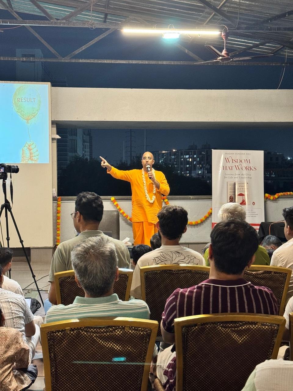 Author speaking at literary gathering